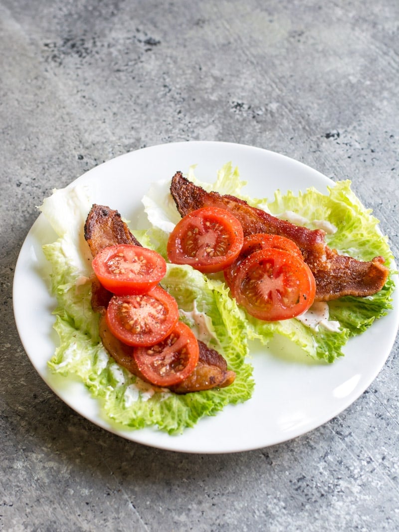 Looking for an easy keto lunch recipe? These Keto BLT Lettuce Wraps are naturally low in carbs and perfect for a grab and go keto meal! #keto