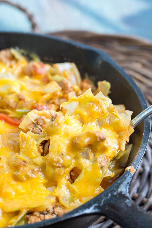 This Low Carb Cheesy Cabbage Casserole is a one pan, easy dinner ready in 30 minutes! The perfect easy keto dinner! Under 9 net carbs per serving! #keto