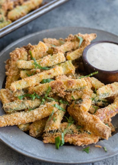 These Crispy Zucchini Fries are breaded with almond flour, parmesan and spices and baked until perfectly crispy! The perfect keto, low carb side dish! #keto