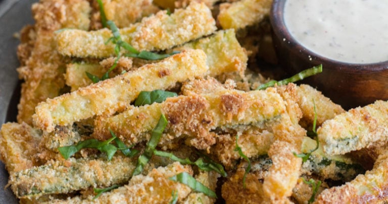 These Crispy Zucchini Fries are breaded with almond flour, parmesan and spices and baked until perfectly crispy! The perfect keto, low carb side dish! #keto