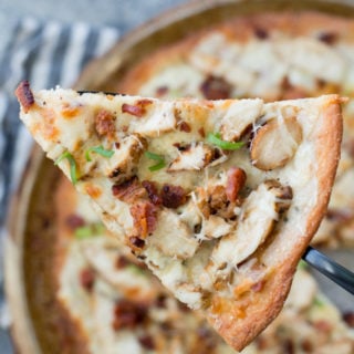 This easy Keto Chicken Bacon Ranch Pizza has a perfectly crispy low carb crust and is loaded with grilled chicken and bacon! Only 3 net carbs per slice! #keto #lowcarb