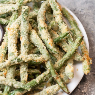 Try these low carb Crispy Green Bean Fries perfect for a game day snack! You can make these keto fries in the oven or air fryer! 