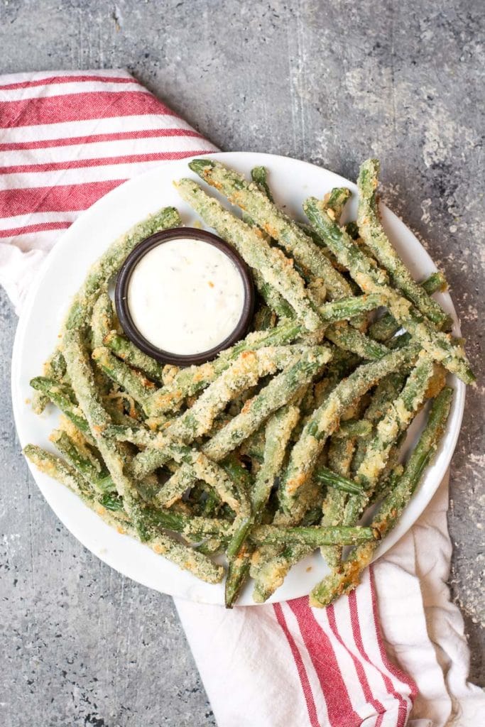 Try these low carb Crispy Green Bean Fries perfect for a game day snack! You can make these keto fries in the oven or air fryer!  #keto