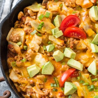 This easy One Pan Cheesy Taco Cabbage Skillet is packed with meat, cabbage, Mexican flavors and loaded with cheese! It is a low carb, keto dinner that everyone will love! #keto