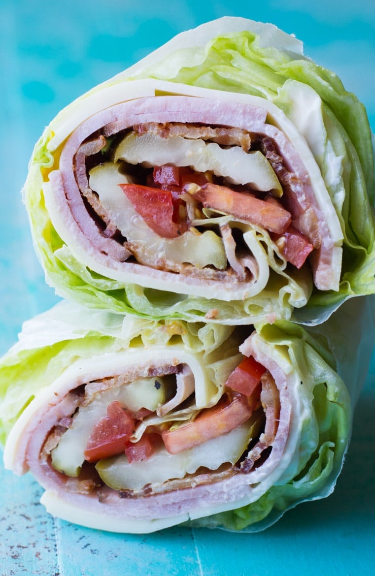 Looking for a new keto lunch? This Keto Club Lettuce Wrap is packed with thick slices of ham, bacon, cheese, crunchy lettuce and juicy tomatoes! This filling lunch is under 4 net carbs! #keto #mealprep