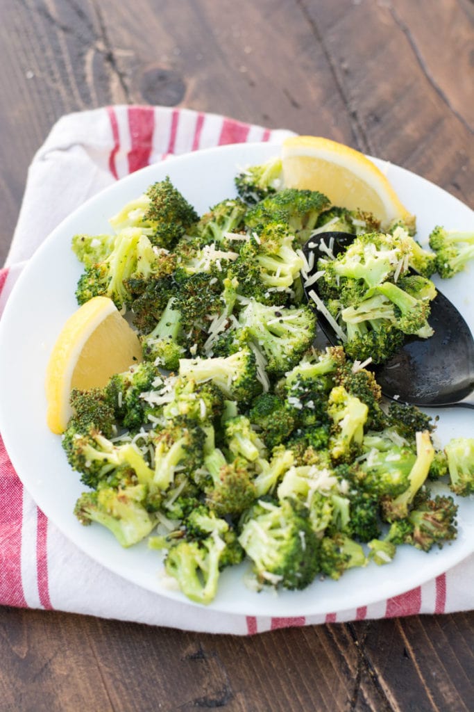 This tender and perfectly crispy Air Fryer Roasted Broccoli only takes 8 minutes to make and has three net carbs! This is the perfect low carb, keto side dish that goes with anything! #keto #airfryer