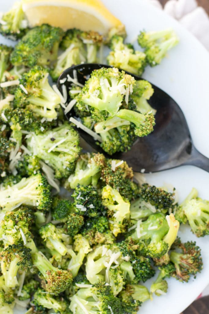 This tender and perfectly crispy Air Fryer Roasted Broccoli only takes 8 minutes to make and has three net carbs! This is the perfect low carb, keto side dish that goes with anything! #keto #airfryer