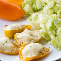 These easy Keto Cheesy Chicken Stuffed Peppers are about one net carb each! A great low carb, healthy dinner or snack! #keto