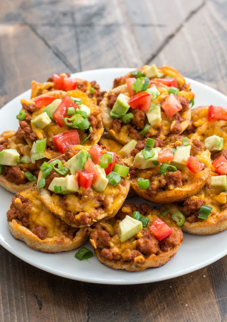 These easy Keto Taco Cups are made with low carb fat head dough, seasoned taco meat and cheddar cheese! Each cup is less than 2 net carbs and loaded with taco flavor! #keto