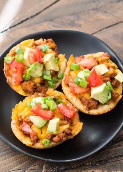 These easy Keto Taco Cups are made with low carb fat head dough, seasoned taco meat and cheddar cheese! Each cup is less than 2 net carbs and loaded with taco flavor! #keto