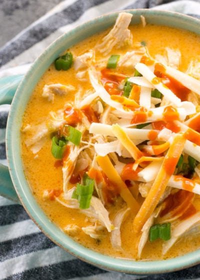 This low carb Instant Pot Buffalo Chicken Soup is loaded with tender shredded chicken, spicy buffalo sauce and tons of cheese! Under 5 net carbs per serving and perfect for keto meal prep! #keto