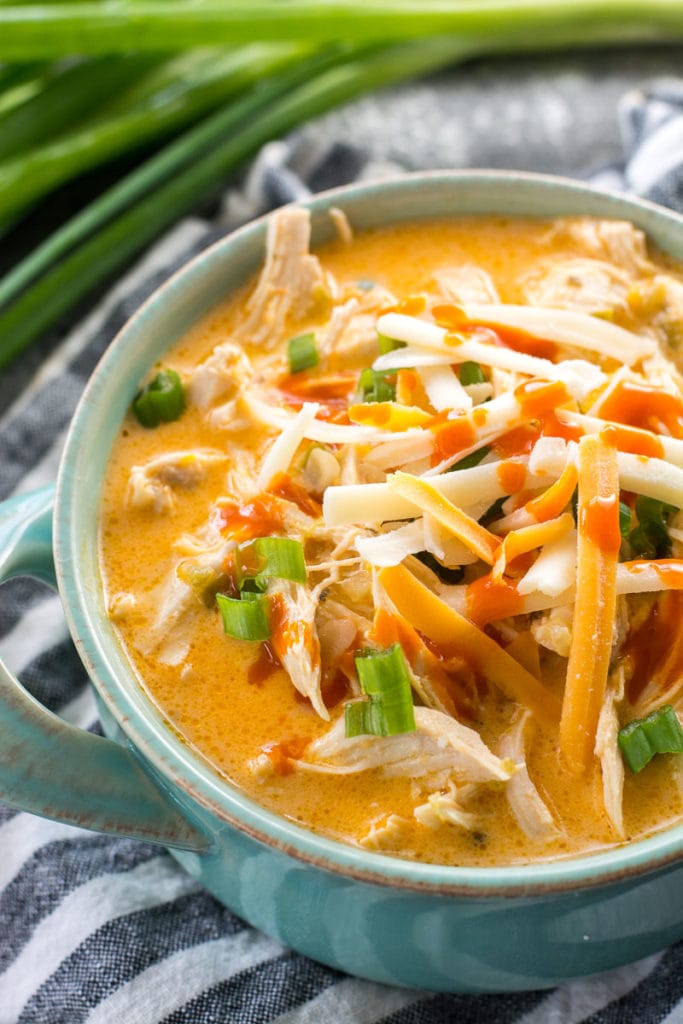 This low carb Instant Pot Buffalo Chicken Soup is loaded with tender shredded chicken, spicy buffalo sauce and tons of cheese! Under 5 net carbs per serving and perfect for keto meal prep! #keto