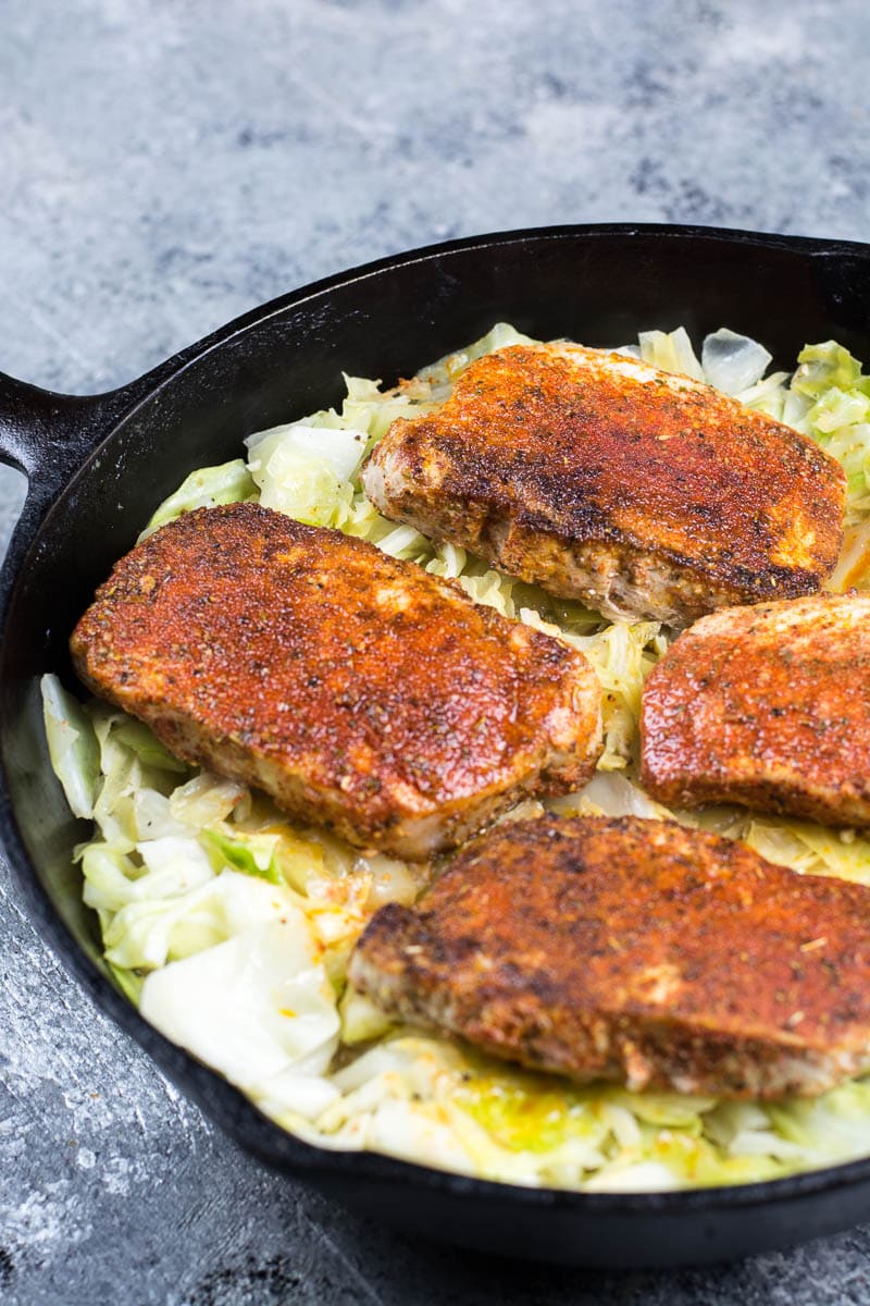 This recipe for Cajun Pork Chops and Cabbage is the easiest one-pan, 30-minute meal! At just 3.7 net carbs, this is a low-carb, keto-approved dinner you will love!