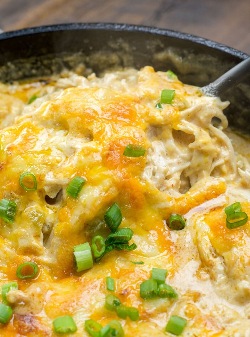 This easy One Pan Keto Green Chili Chicken is the ultimate cheesy low carb casserole! At under 4 net carbs per serving this will be a weekly staple on your keto diet! #keto