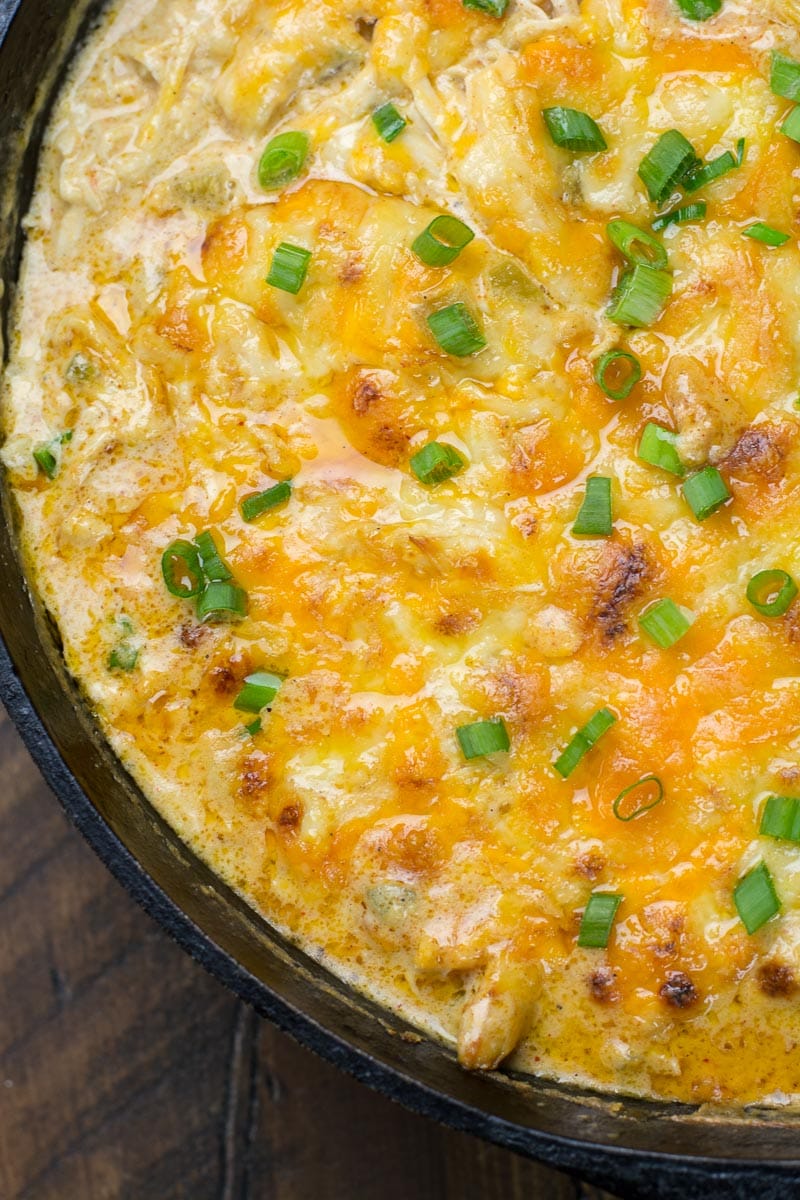 This easy One Pan Keto Green Chili Chicken is the ultimate cheesy low carb casserole! At under 4 net carbs per serving this will be a weekly staple on your keto diet! #keto