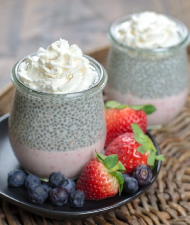 This decadent Keto Strawberry Cheesecake Parfaits feature a creamy strawberry cheesecake layer topped with vanilla chia seed pudding! A sweet keto treat under 5 net carbs!