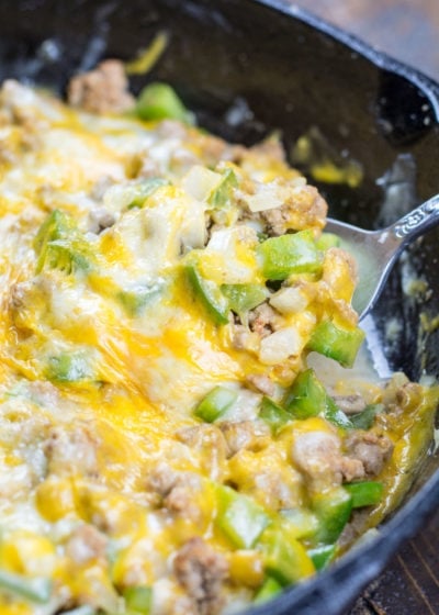 Try this easy One Pan Keto Philly Cheesesteak Skillet for an easy low carb dinner! This 20 minute meal is under 5 net carbs and loaded with ground beef, onions, peppers and cheese!