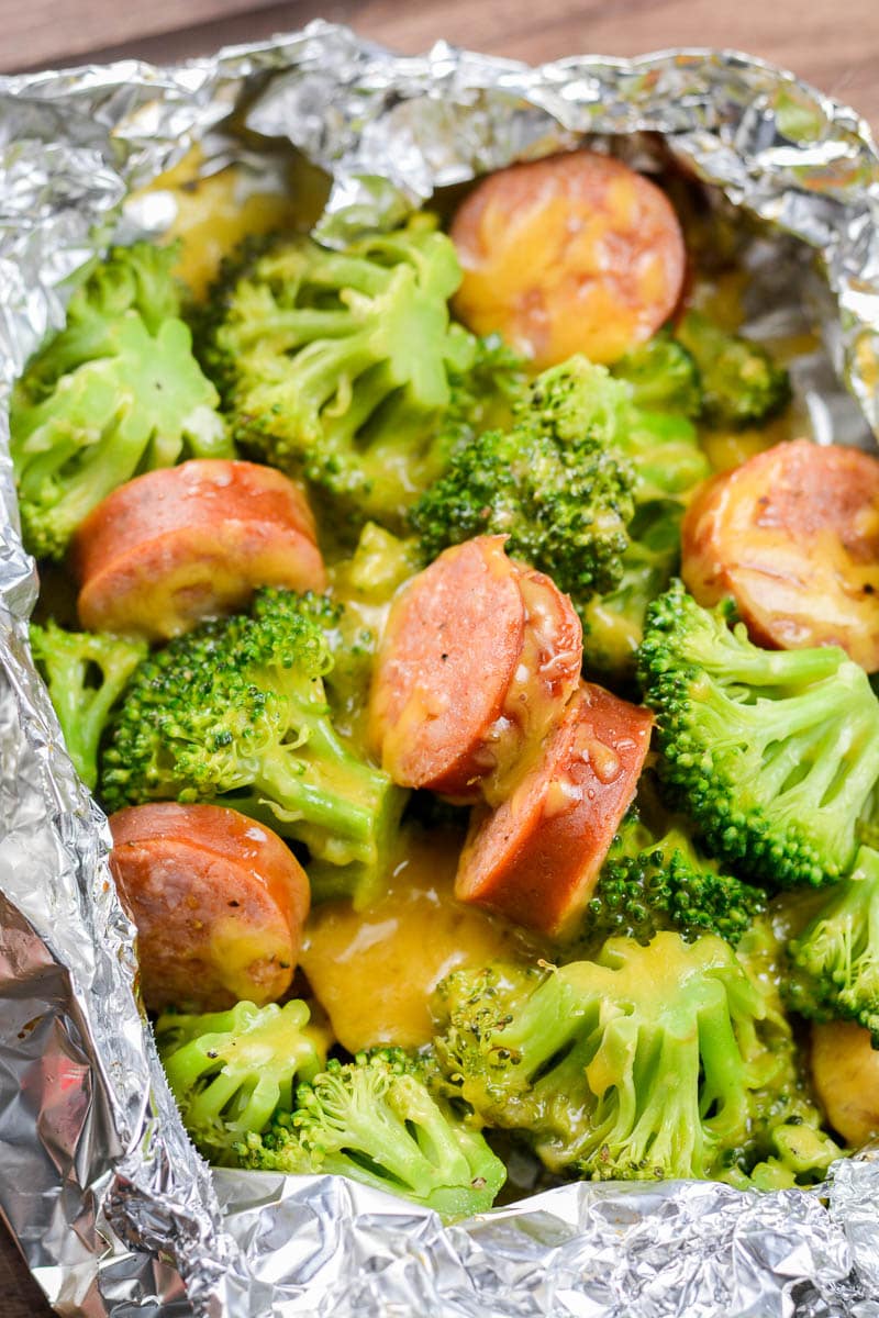 These Sausage Broccoli Cheddar Foil Packs have just three ingredients, are under 7 net carbs and ready in about 20 minutes! This is a simple foil pack recipe perfect for the grill or oven!