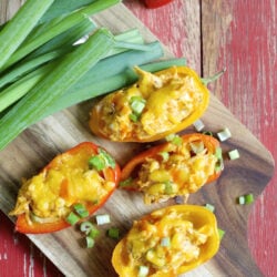 These Keto Buffalo Chicken Stuffed Peppers are packed with tender chicken, buffalo sauce and cheese! This is the perfect easy keto dinner or appetizer for about 5 net carbs per serving!