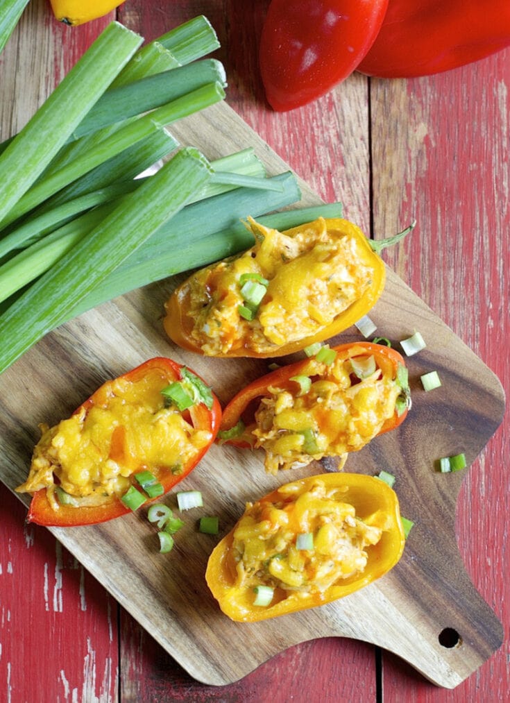 These Keto Buffalo Chicken Stuffed Peppers are packed with tender chicken, buffalo sauce and cheese! This is the perfect easy keto dinner or appetizer for about 5 net carbs per serving!