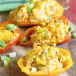 These Keto Buffalo Chicken Stuffed Peppers are packed with tender chicken, buffalo sauce and cheese! This is the perfect easy keto dinner or appetizer for about 5 net carbs per serving!