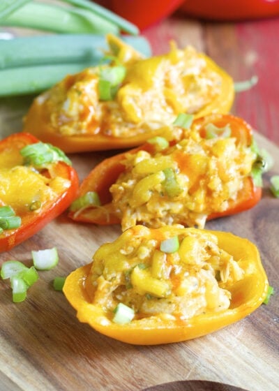 These Keto Buffalo Chicken Stuffed Peppers are packed with tender chicken, buffalo sauce and cheese! This is the perfect easy keto dinner or appetizer for about 5 net carbs per serving!