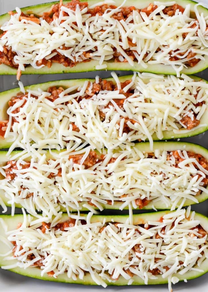 These easy Keto Pizza Zucchini Boats have about 2 net carbs each and only 5 simple ingredients! This is the perfect way to satisfy those pizza cravings on a low carb diet!