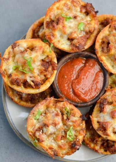 These easy Keto Pizza Muffins are loaded with Italian sausage, marinara and cheese! These gluten free, keto-friendly pizza bites have less than 3 net carbs each and are perfect for meal prep!