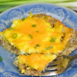 This Easy Keto Breakfast Casserole is loaded with sausage, cream cheese and scrambled eggs atop a low carb, almond flour crust! This filling casserole is just 1.2 net carbs per slice!