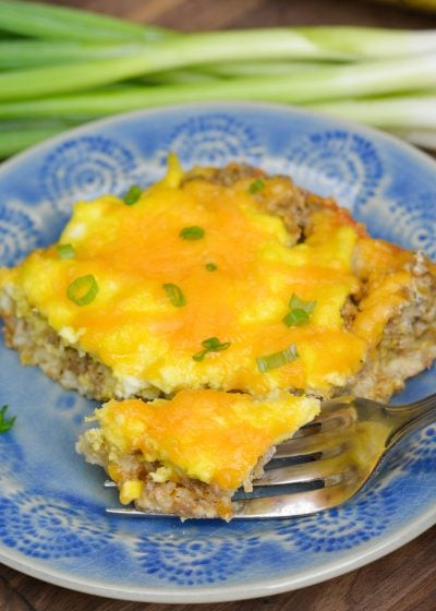 This Easy Keto Breakfast Casserole is loaded with sausage, cream cheese and scrambled eggs atop a low carb, almond flour crust! This filling casserole is just 1.2 net carbs per slice!