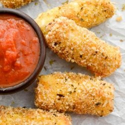 These Easy Keto Mozzarella Sticks are covered in an ultra crispy crust and fried to perfection! 