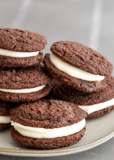 These Classic Keto Whoopie Pies feature a soft, chewy cookie with light and fluffy vanilla filling! These low carb treats are less than 5 net carbs each, and naturally gluten free! 