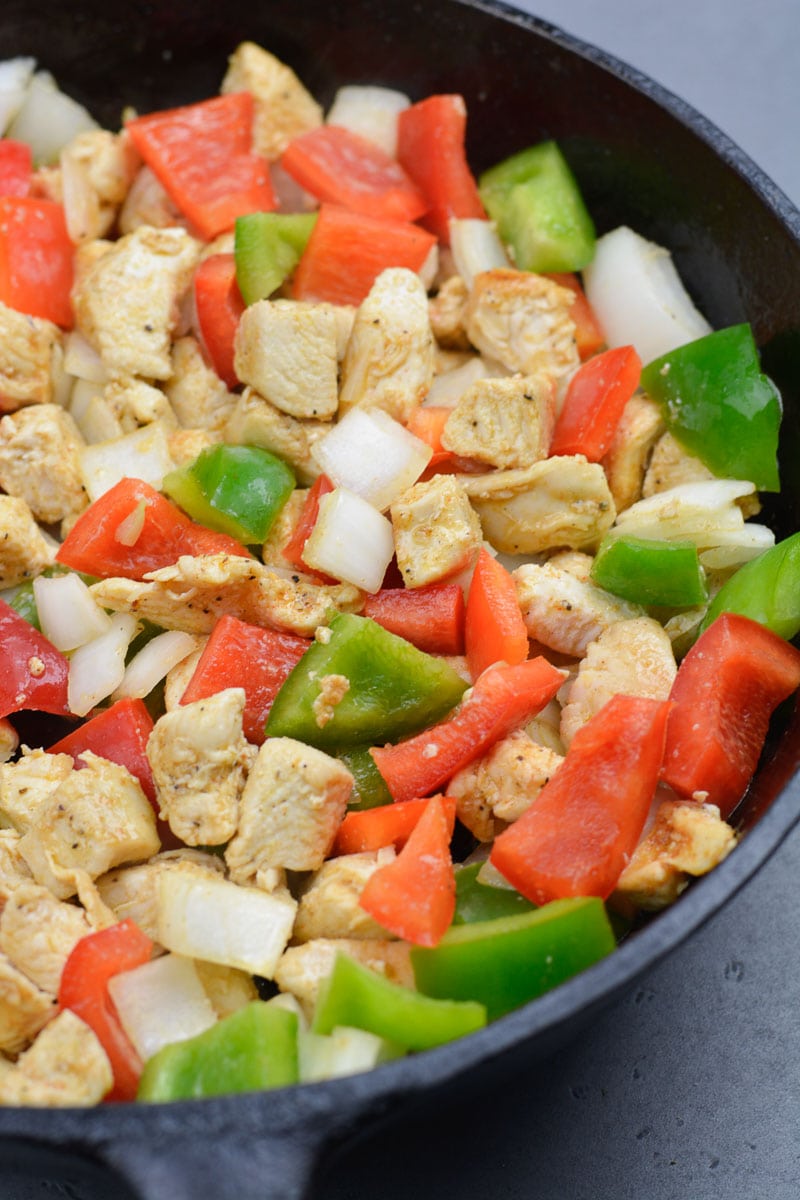 Try this Chicken Philly Cheesesteak Skillet packed with pan seared chicken, mushrooms, bell peppers and onions. This easy one pan recipe has less than 5 net carbs per serving! 