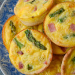 This savory Keto Ham and Cheese Quiche is the perfect low carb brunch recipe! Packed with smoked ham, tender asparagus and sharp cheddar cheese this will be a family favorite! 