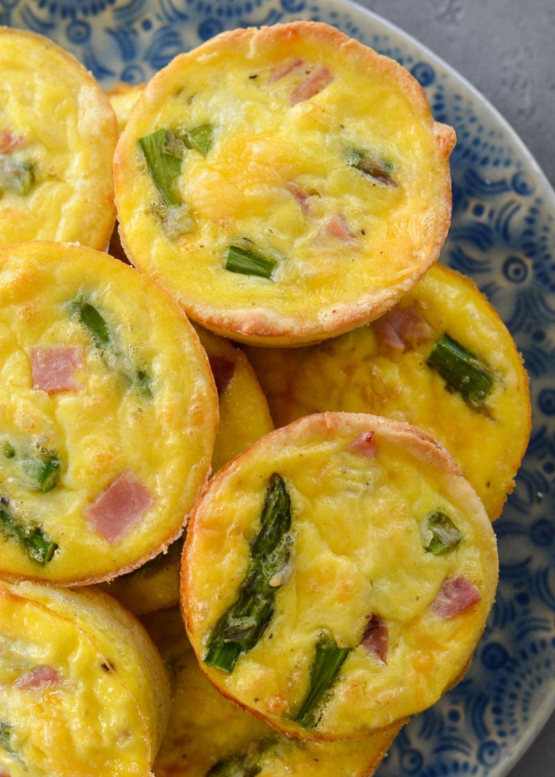 This savory Keto Ham and Cheese Quiche is the perfect low carb brunch recipe! Packed with smoked ham, tender asparagus and sharp cheddar cheese this will be a family favorite! 