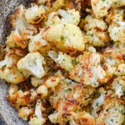 Parmesan Roasted Cauliflower is perfectly seasoned and roasted until crisp and full of flavor! Each serving has about 3 net carbs, making it an excellent keto side dish! 