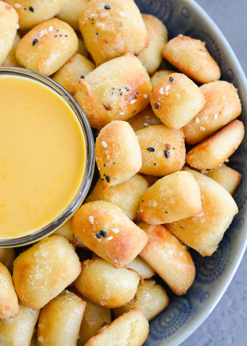 These soft Keto Pretzel Bites with Cheese Sauce are the perfect low carb appetizer! Enjoy 8 bites with cheese dip for less than 5 net carbs! 