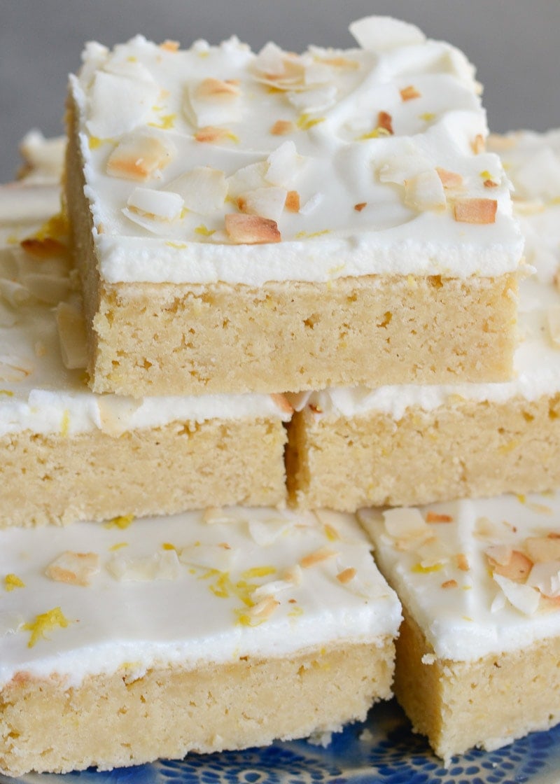 These refreshing Lemon Blondies are covered in a sweet lemon and cream cheese frosting! This keto-friendly treat has less than 3 net carbs per serving! 