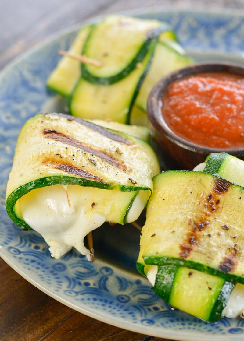 Grilled Zucchini Mozzarella Wraps are the ultimate keto summer side dish! Each wrap contains less than 1 net carb and is perfect dipped in low carb marinara! 