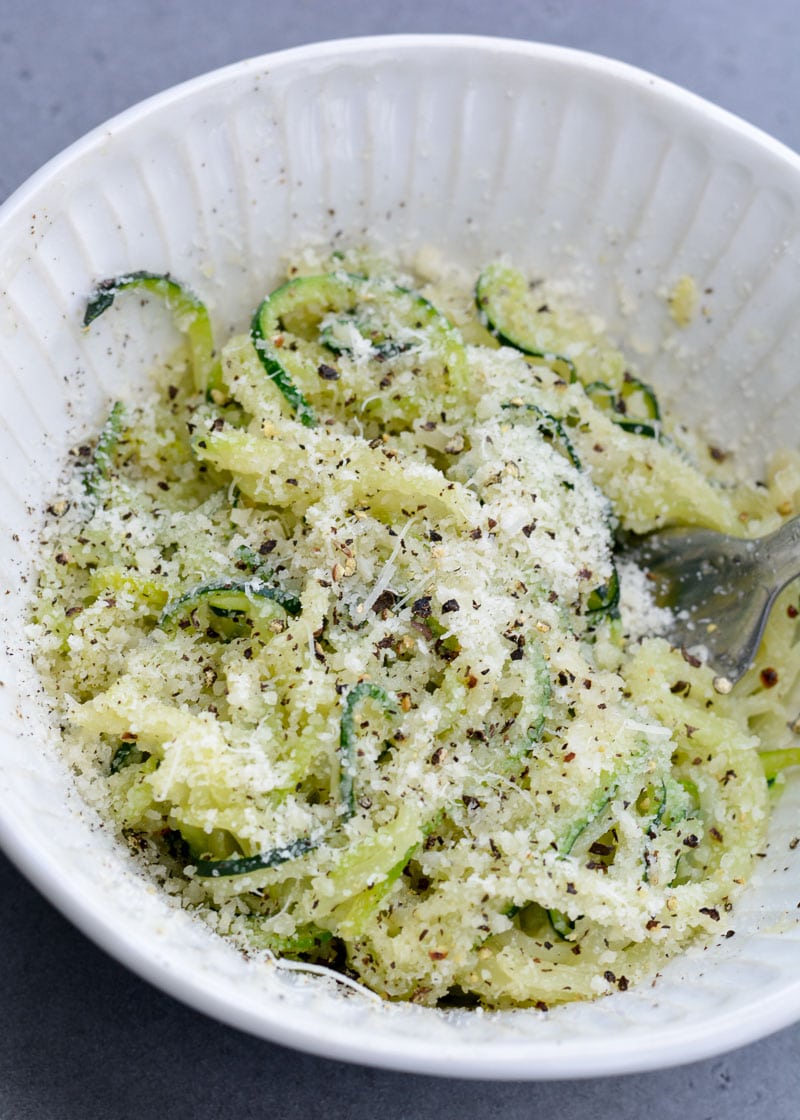 Caico e Pepe Zoodles are a quick and easy, low carb spin on an Italian classic! Buttery zucchini noodles are tossed with freshly grated cheese and loads of pepper for the perfect keto-friendly meal!