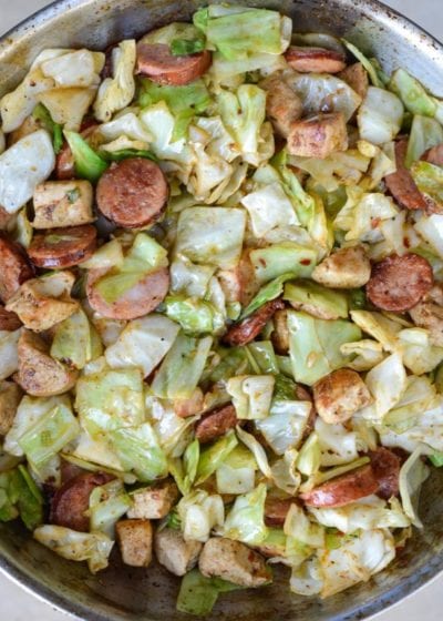  A healthy one pan meal your family will adore, this Cajun Chicken Sausage and Cabbage Skillet will be on your table in less than 3o minutes! Keto friendly and loved by all ages, this meal will disappear almost as quickly as it came together!