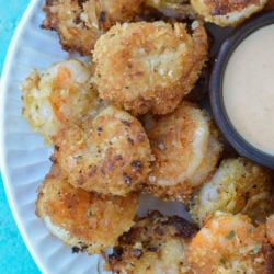 This delicious Keto Coconut Shrimp will quickly join your low-carb dinner rotation! This low-carb seafood dinner can be cooked in 30 minutes or less on the stove, in the oven, or in an Air Fryer!