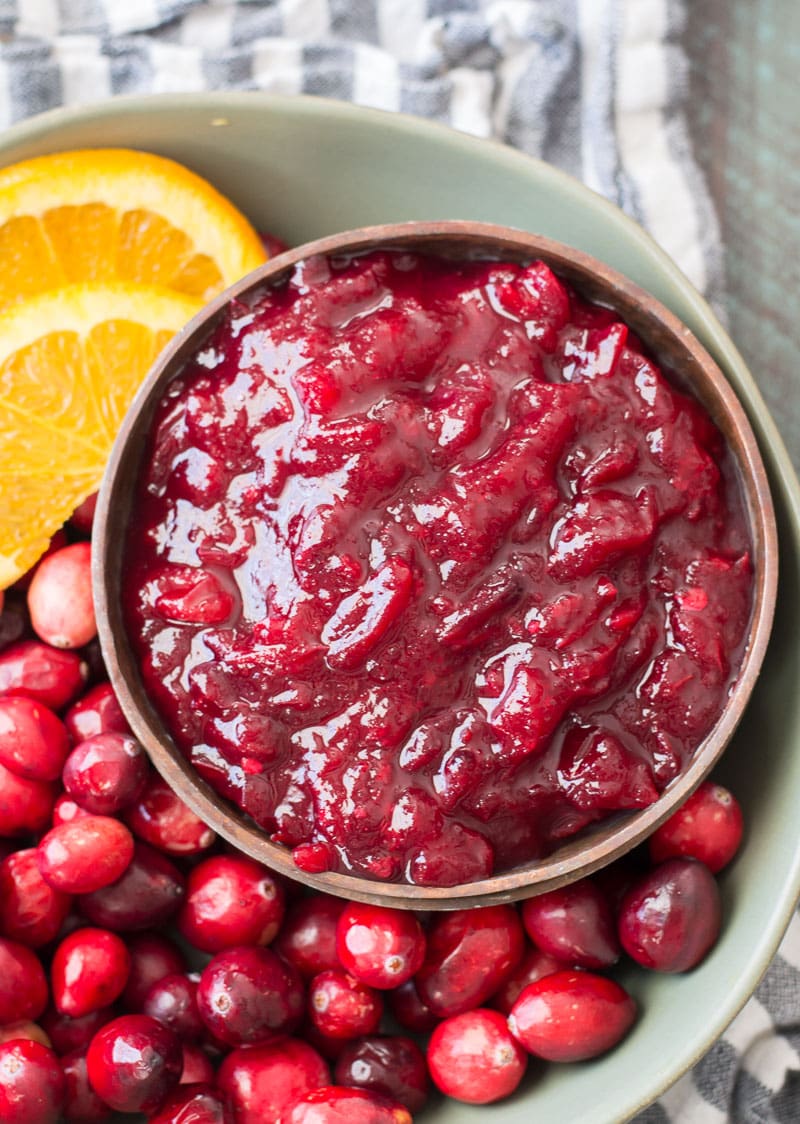 This three-ingredient Keto Cranberry Sauce is essential for your keto holiday spread! Learn how to make small batch, large batch and three different flavors with this easy guide.
