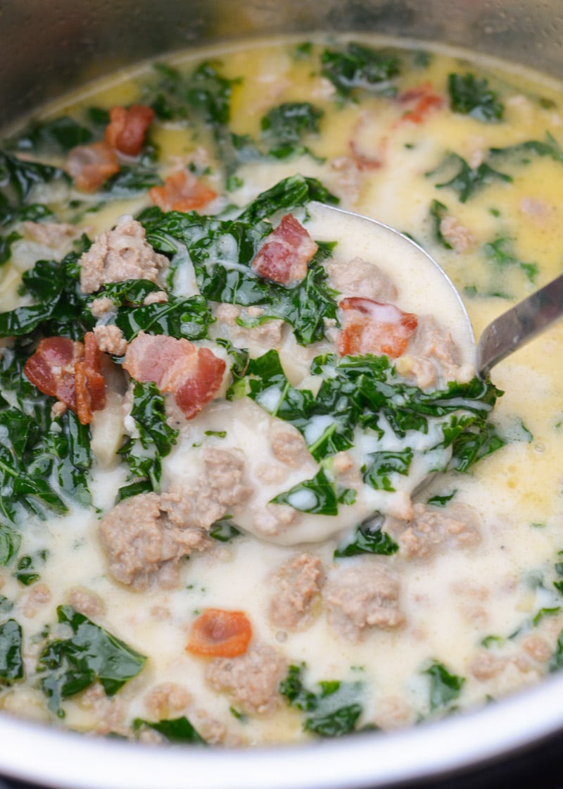 This Instant Pot Zuppa Toscana is loaded with bacon, sausage, garlic and kale! This keto-friendly, low carb soup requires just 5 minutes of pressure cooking and has about 6 net carbs per serving!