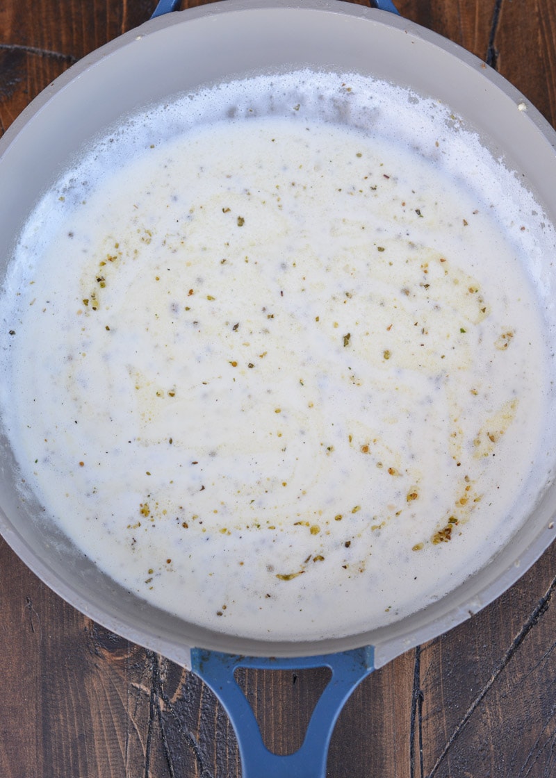 Stir in the seasoning for an amazing, aromatic, flavorful Keto Shrimp Alfredo!
