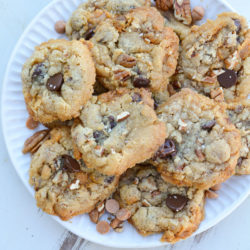 These Kitchen Sink Cookies are perfect for your next cookie exchange or party! This keto cookie recipe is packed with butterscotch, chocolate, and two types of nuts for a salty sweet treat under 3 net carbs!