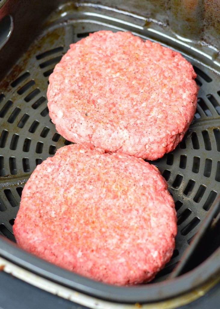 Enjoy a juicy Keto Bacon Cheeseburger for under 7 net carbs! This low carb burger recipe can be made on the grill, in a skillet or in an air fryer!