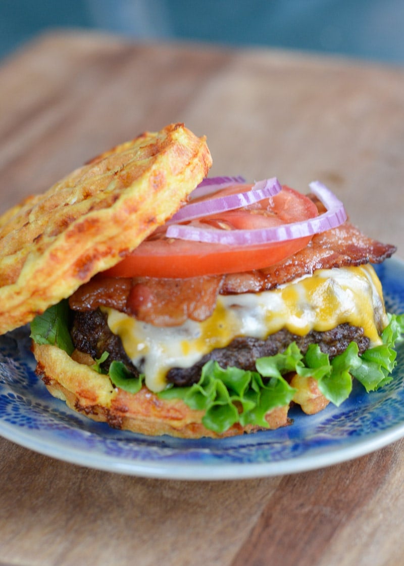 Enjoy a juicy Keto Bacon Cheeseburger for under 7 net carbs! This low carb burger recipe can be made on the grill, in a skillet or in an air fryer! 