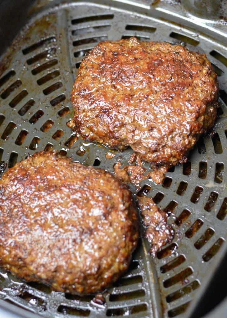 Enjoy a juicy Keto Bacon Cheeseburger for under 7 net carbs! This low carb burger recipe can be made on the grill, in a skillet or in an air fryer!