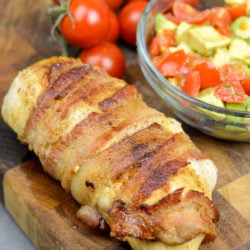 This easy Bacon Wrapped Chicken Breast is a one pan, 30 minute meal! This keto friendly chicken recipe is great with roasted vegetables and reheats well for weekly meal prep!